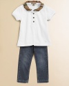 Casual yet chic, this classic top is reinvented with a ruffled check collar.Ruffled check collar Partial front button closure Short sleeves Embroidered logo at the hem Cotton Machine wash Imported Please note: Number of buttons may vary depending on size ordered. 