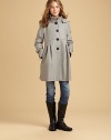 Wonderfully warm wool, featuring feminine pleating and a detachable hood.Detachable hoodStand collarButton frontEmpire seam with pleated detailsSide slash pocketsLong sleeves with button cuffsBack button-down ventFully lined60% wool/30% polyester/10% viscoseDry cleanImported