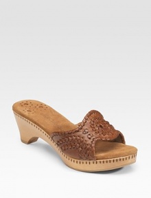 Woven leather slide inspired from classic Native American craftsmanship.Stacked wooden heel, 2¼ (60mm)Stacked wooden platform, ¾ (20mm)Compares to a 1½ heel (40mm)Leather upperSuede liningLeather solePadded insoleImportedOUR FIT MODEL RECOMMENDS ordering true size.. Woven leather slide inspired from classic Native American craftsmanship.Stacked wooden heel, 2¼ (60mm)Stacked wooden platform, ¾ (20mm)Compares to a 1½ heel (40mm)Leather upperSuede liningLeather solePadded insoleImportedOUR FIT MODEL RECOMMENDS ordering true size..