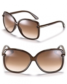 Sleek oversized sunglasses with knot detail at temples from Tom Ford. Sleek oversized sunglasses with knot detail at temples from Tom Ford.