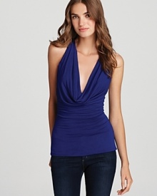 This Sky cowlneck top flaunts faux-leather braided straps at the back that lead to an intricate cutout design.