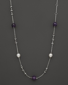 This sterling silver necklace, gleaming with amethysts and freshwater pearls, makes an elegant statement. By Di MODOLO. This sterling silver necklace, gleaming with amethysts and freshwater pearls, makes an elegant statement. By Di MODOLO.
