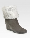 Luscious rabbit fur upgrades this casual suede boot with a versatile fold-over shaft. Hidden wedge, 3½ (90mm)Unfolded shaft, 9Leg circumference, 12Weatherproof suede upper with faux fur trimBack zipBreathable microfiber liningSlip resistant rubber solePadded insoleMade in Italy