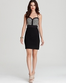 An ornately woven bodice lends an artisan feel to this summer-perfect GUESS dress, cut in a curve-defining silhouette. An ornately woven bodice lends an artisan feel to this summer-perfect GUESS dress, cut in a curve-defining silhouette.