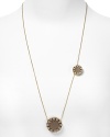 Try this versatile necklace with the larger pendant in front or switch to the smaller pendant in front. Wear it doubled or wrapped around and knotted like a lariat. For those sexy low-back dresses or shirts, drape it halfway down your back for real drama.