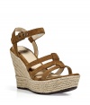 Channel 1970s style with these chic suede wedges from UGG Australia - Multi-strap front, ankle strap with buckle closure, tall platform with woven details - Style with denim cut offs, a billowy blouse, and a floppy hat