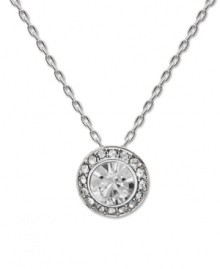 Subtle sparkle for the savvy fashionista. Swarovski's chic circular pendant features a round-cut crystal center stone surrounded by a halo of glittering crystals. Setting and chain crafted in silver tone mixed metal. Approximate length: 15 inches. Approximate drop: 3/4 inches.