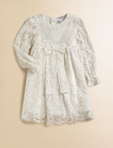 Nothing's lovelier for your little girl than the airy swirls of this lavish lace frock with a flowing skirt and a scalloped hem.Round necklineLong sleeves with ruffled cuffsEmpire waist with bowBack button closeSilk/cotton liningRayon/cotton/nylon/silkDry cleanImported Please note: Number of buttons may vary depending on size ordered. Nothing's lovelier for your little girl than the airy swirls of this lavish lace frock with a flowing skirt and a scalloped hem.Round necklineLong sleeves with ruffled cuffsEmpire waist with bowBack button closeSilk/cotton liningRayon/cotton/nylon/silkDry cleanImported Please note: Number of buttons may vary depending on size ordered.
