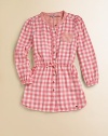 Rendered in pure cotton, this soft and sweet gingham print frock is perfect for school, play or a party.CrewneckLong puffed sleeves with button cuffButton frontElastic waist with tieFront patch pocket and two side slash pocketsShirttail hemCottonMachine washImported Please note: Number of buttons/snaps may vary depending on size ordered. 