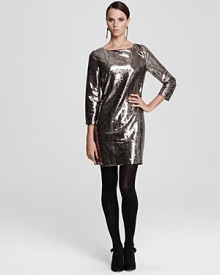 Imbue your evening look with serpentine shine in this Tahari Woman python sequin dress, designed to dazzle in an allover sequin pattern.