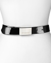 Reversible from Burberry's signature check print to patent black, this classic belt features a polished buckle closure with an engraved logo.