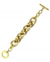 Bold and beautiful. This chain bracelet from Vince Camuto is crafted from gold-tone mixed metal, with glass crystal pave accents adding a lustrous touch. Approximate length: 8 inches.