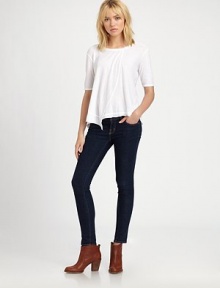 Crisp cotton tee styled with dropped shoulders, elbow-length sleeves and an asymmetrical hem. RoundneckDropped shouldersElbow-length sleevesAsymmetrical hemCottonMachine washMade in USAModel shown is 5'10 (177cm) wearing US size Small. Crisp cotton tee styled with dropped shoulders, elbow-length sleeves and an asymmetrical hem. RoundneckDropped shouldersElbow-length sleevesAsymmetrical hemCottonMachine washMade in USAModel shown is 5'10 (177cm) wearing US size Small.
