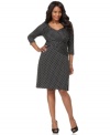 A flattering crisscross front elegantly defines Elementz' three-quarter sleeve plus size dress, featuring a built-in slimming panel-- it's perfect for work!