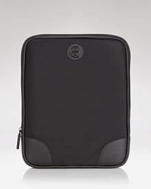 Get down to business with this nylon tablet case from Tory Burch, sure to be your prettiest new partner. Get down to business with this nylon tablet case from Tory Burch, sure to be your prettiest new partner.