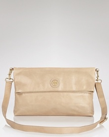 Versatile and polished. Tory Burch's leather messenger bag epitomizes day-right accessorizing, with a convertible shape, neutral hue and sleek look. Versatile and polished. Tory Burch's leather messenger bag epitomizes day-right accessorizing, with a convertible shape, neutral hue and sleek look.