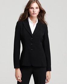 A smart, three-button silhouette lends polish to this tailored T Tahari jacket. A smart, three-button silhouette lends polish to this tailored T Tahari jacket.