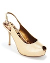 A chic keyhole peeptoe finishes these polished pumps from Sam Edelman. In black or leopard, they're a striking neutral.