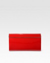 This hand-held design features beautifully shiny patent leather.Hinged magnetic closureOne inside open pocketSatin lining9W X 5H X 2DMade in Italy
