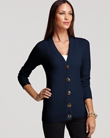 Add pop to basics with a casual-luxe Tory Burch cardigan, featuring golden logo buttons and a flattering slim silhouette. Add pop to basics with a casual-luxe Tory Burch cardigan, featuring golden logo buttons and a flattering slim silhouette.