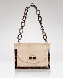 This season, Tory Burch styles your look rare with this shoulder bag, crafted for maximum impact in a mix of embossed leather with a distinctly polished shape. This season, Tory Burch styles your look rare with this shoulder bag, crafted for maximum impact in a mix of embossed leather with a distinctly polished shape.