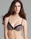 A crepe push-up bra in a cool print with lace trim.