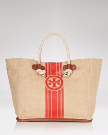 Tory Burch's straw tote is a perfect companion for your casual looks. When weekend adventures beckon, this beachy bag is at its best when filled to the brim. Tory Burch's straw tote is a perfect companion for your casual looks. When weekend adventures beckon, this beachy bag is at its best when filled to the brim.