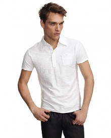 Lightweight short sleeve slub jersey polo shirt with snap pocket at chest. Lightweight short sleeve slub jersey polo shirt with snap pocket at chest.