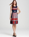 BCBGMAXAZRIA brings the tribal print up to speed with this modern interpretation--crafted with pretty pleats, a hardware-detailed belt, and an Americana-inspired palette.