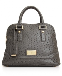 Add a dose of high-society glam to your everyday style by carrying this ostrich skin print bag by Ivanka Trump. With gorgeous goldtone hardware and a classic satchel silhouette, elegance has never looked so effortless. Add a dose of high-society glam to your everyday style by carrying this ostrich skin print bag by Ivanka Trump. With gorgeous goldtone hardware and a classic satchel silhouette, elegance has never looked so effortless.