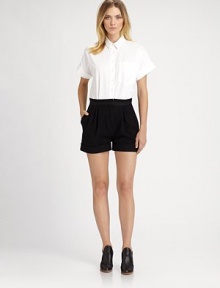 This clever, strategically tailored one-piece style lends the illusion of perfectly paired separates.Point collarButton frontPatch pocketShort cuffed sleevesSide slash pocketsFront pleatsCuffed legBack welt pockets About 32 from shoulder to hemCottonDry cleanMade in ItalyModel shown is 5'10½ (179cm) wearing US size 4. 