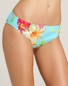 Second best to an all-expenses-paid Hawaiian vacation, this Ralph Lauren Blue Label bikini bottom boasts a bold floral print in a tropical palette.