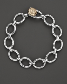 A luxurious crescent bracelet from Tacori crafted from polished .925 silver ovals, with 18 Kt. gold gem seal toggle closure. Designed by Tacori. A luxurious crescent bracelet from Tacori crafted from polished .925 silver ovals, with 18 Kt. gold gem seal toggle closure. Designed by Tacori.