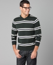 A simple, streamlined stripe gives this Tommy Hilfiger sweater classic appeal. A simple, streamlined stripe gives this Tommy Hilfiger sweater classic appeal.