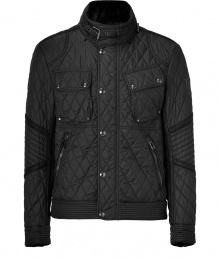 With its lighter weight and cool moto styling, Belstaffs quilted jacket is a sleek choice for transitioning into the new season in style - Belted stand-up collar, long sleeves, snapped cuffs, hidden front zip with snap panel, zippered slit and snapped patch pockets, belted sides - Contemporary straight fit - Wear with jeans and shearling lined boots With its lighter weight and cool moto styling, Belstaffs quilted jacket is a sleek choice for transitioning into the new season in style - Belted stand-up collar, long sleeves, snapped cuffs, hidden front zip with snap panel, zippered slit and snapped patch pockets, belted sides - Contemporary straight fit - Wear with jeans and shearling lined boots