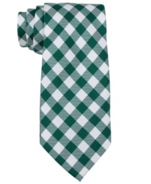 Bring classic country to the corner office with this fresh gingham skinny tie from Tommy Hilfiger. Bring classic country to the corner office with this fresh gingham skinny tie from Tommy Hilfiger.