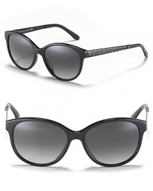 Small cat eye sunglasses with polka dot embellished arms, a stylish statement for any season. Small cat eye sunglasses with polka dot embellished arms, a stylish statement for any season.