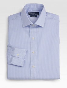 A trim, modern Regent dress shirt is handsomely crafted from breathable cotton will with simple stripes. Buttonfront Moderate spread collar Cotton Machine wash Imported 