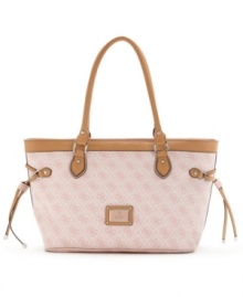 The scandal would be to leave it home! With GUESS's signature quatrefois G monogram print, side drawstrings and a rectangular silhouette that's the right shape for shopping, this chic carryall will be your go-to bag. The scandal would be to leave it home! With GUESS's signature quatrefois G monogram print, side drawstrings and a rectangular silhouette that's the right shape for shopping, this chic carryall will be your go-to bag.