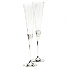 The With Love Toasting Flutes are the perfect addition when celebrating your most memorable moments. The flute pair is delicately accented by silver bands that replicate Vera Wang's most iconic jewelry collection. The With Love Toasting Flutes are the perfect addition when celebrating your most memorable moments. The flute pair is delicately accented by silver bands that replicate Vera Wang's most iconic jewelry collection.