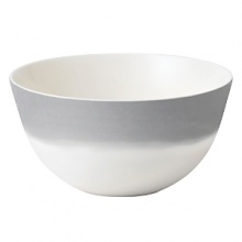 A watercolor wash of gradient gray migrates toward a warm neutral center to create an organic ombre effect on this durable, adaptable bowl from Vera Wang. A watercolor wash of gradient gray migrates toward a warm neutral center to create an organic ombre effect on this durable, adaptable bowl from Vera Wang.