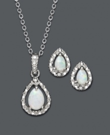 Splash yourself in iridescent shine. Victoria Townsend's shimmery jewelry set highlights pear-cut opals (5/8 ct. t.w.) and round-cut diamond accents. Crafted in sterling silver. Approximate length: 18 inches. Approximate pendant drop: 11/16 inch. Approximate earring drop: 5/16 inch. Splash yourself in iridescent shine. Victoria Townsend's shimmery jewelry set highlights pear-cut opals (5/8 ct. t.w.) and round-cut diamond accents. Crafted in sterling silver. Approximate length: 18 inches. Approximate pendant drop: 11/16 inch. Approximate earring drop: 5/16 inch.