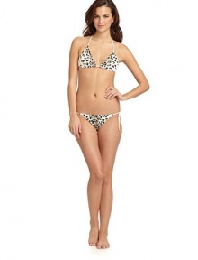 THE LOOKAllover leopard print with golden sequinsHalter straps tie at neckAdjustable padded triangle cupsBack tie closure with bead accentsTHE MATERIAL87% nylon/13% spandexFully linedCARE & ORIGINHand washImportedPlease note: Bikini bottom sold separately. THE LOOKAllover leopard print with golden sequinsHalter straps tie at neckAdjustable padded triangle cupsBack tie closure with bead accentsTHE MATERIAL87% nylon/13% spandexFully linedCARE & ORIGINHand washImportedPlease note: Bikini bottom sold separately.