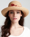 A charming raffia sun hat with rolled brim and ombré ribbon trim.