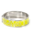 MARC BY MARC JACOBS' enamel bangle has designer appeal. Emblazoned with the label's logo, this simple silvery bracelet has fashion forward written all over it.