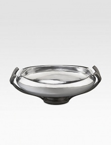 Crafted from stunning metal alloy, this lovely bowl artfully frames whatever you put in it with a gently curling lip, glossy shine and graceful pedestal base. From the Anvil Collection Iron-finish metal alloy 2-quart capacity 14¼W X 4H X 10D Hand wash Imported Crafted from stunning metal alloy, this lovely bowl artfully frames whatever you put in it with a gently curling lip, glossy shine and graceful pedestal base. From the Anvil Collection Iron-finish metal alloy 2-quart capacity 14¼W X 4H X 10D Hand wash Imported