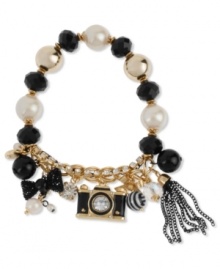 Take a picture, it'll last longer. Betsey Johnson's half-stretch bracelet features gold and black tone bracelet chains, crystal cup chain accent, multi-bead stretch chain, black camera charm with gold tone details and crystal accent, round crystal, black mesh bow with glass pearl, gold tone bow with striped bead and black tone multi-chain fringe. Approximate length: 7-1/2 inches.