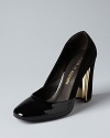 Suede meets polish in these Pour La Victoire heels. They shine with metal details at each heel and high-gloss cap toes.