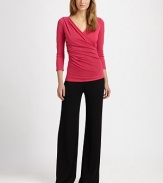 Flattering details like shoulder pleats and bodice ruching make this design a must-have.V-necklineThree-quarter sleevesPleats on shouldersRuched detailsAbout 24 from shoulder to hem70% rayon/24% polyester/6% spandexDry cleanImported Model shown is 5'10½ (179cm) wearing US size Small. 