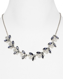 Delicate clusters of colored stones are a glamorous focal point on this Carolee necklace, crafted of silver plated metal.